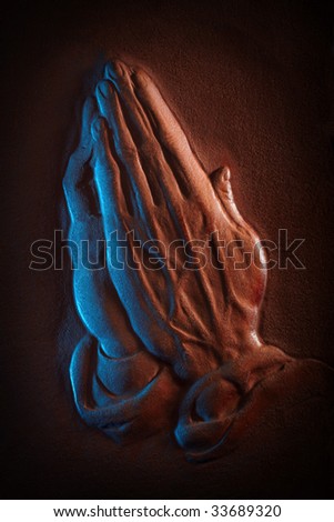 stock photo Leather sculpted in the shape of praying hands