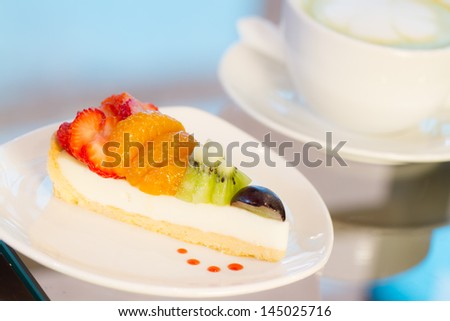 Fruit tart cake and green tea latte