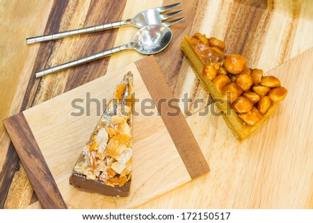 almond sliced chocolate cheesecake and macadamia caramel cheesecake