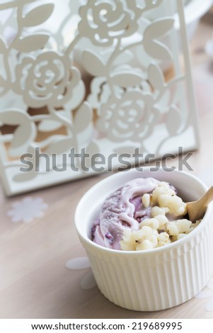 healthy brown rice ice cream topped with job\'s-tears in white bowl