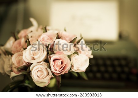 vintage flower bouquet with typewriter in background