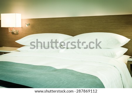 double bed setup with four pillows