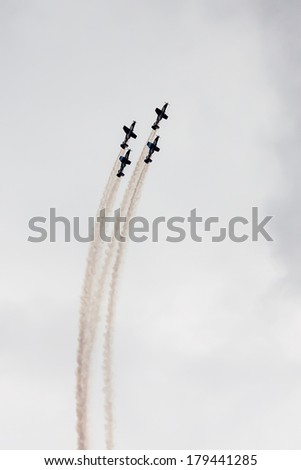 TEL NOF, ISRAEL -APRIL 17: Four army training airplanes performing an exhibition exercise during the Israeli Independence day show on April 17, 2013 in Tel Nof, Israel.