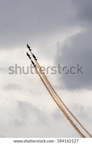 TEL NOF, ISRAEL -APRIL 17: Four army training airplanes performing an exhibition exercise during the Israeli Independence day show on April 17, 2013 in Tel Nof, Israel.