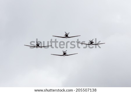 TEL NOF, ISRAEL -APRIL 16: Four army training airplanes performing an exhibition exercise during the Israeli Independence day show on April 16, 2013 in Tel Nof, Israel.