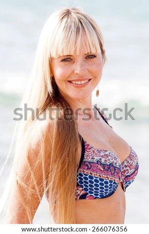 pretty young freckle woman outdoor  in summertime