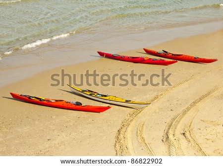 sea kayaks on the beach