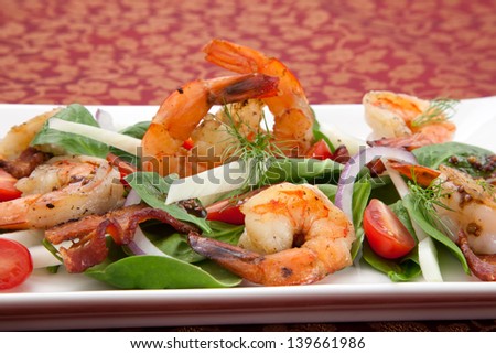 Shrimp and spinach salad with grape tomatoes and balsamic mustard vinaigrette