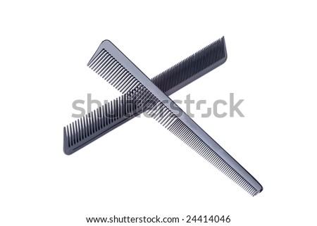 Closeup of two black barber combs on white