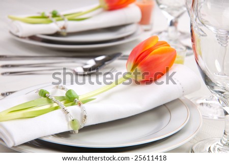 stock photo Fine food and wine spring table settings with fresh tulips