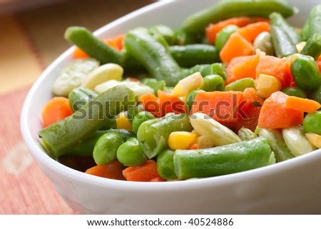 Closeup of healthy green bean and carrot organic salad plate