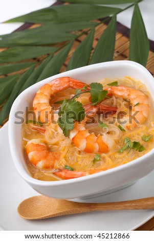 laksa soup. stock photo : Closeup of bowl of Prawn Laksa soup with rice noodles, shrimps garnished