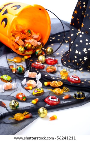 Scatter Halloween candies over Wizard hat