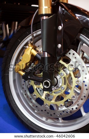 Front wheel of motorcycle, large break disc, black mudguard