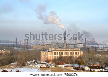 pipe smokes old factory. Environmental contamination