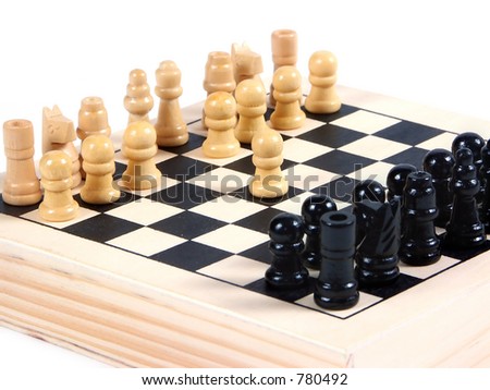 chess pawns on two side of a board - white begins