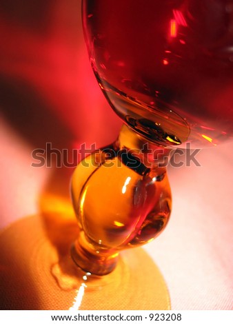 glass of red wine with a red shadow