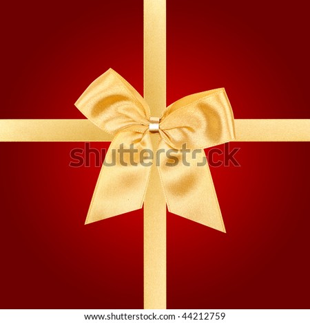 Gold gift bow on square red card