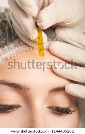 prp forehead woman treatment. facial cosmetology skin therapy, Girl face rejuvenation.