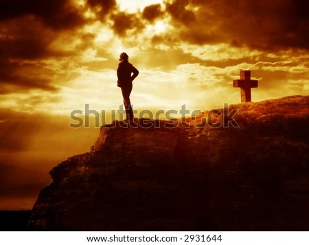 Dramatic sky scenery with a mountain cross and a thinking person. A symbol of heavy inner struggles. Where to go? What do you say?