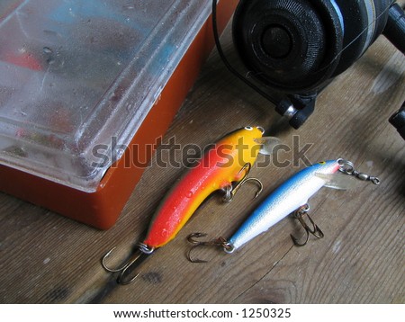 Fishing lures, spinning reel and a lure box