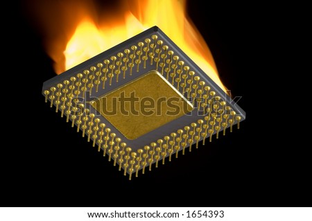 Computer CPU processor on fire. Isolated on black background.