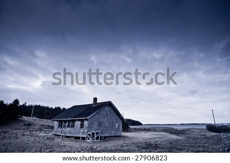 Abandoned old wooden schoolhouse in countryside. Photo taken at Yarmouth, Nova Scotia (Canada).