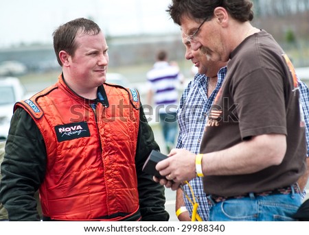 HALIFAX, NS - May 9: Race car driver Lowell Affleck and pit crew from the Maritime Pro Stock Tour at a Tech \'n Tune event at Scotia SpeedWorld on May 9th.