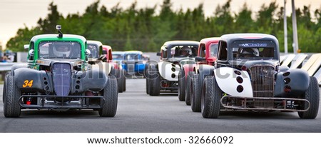 HALIFAX, NOVA SCOTIA - JUNE 19: Race cars in formation prior to Maritime League of Legends racing action at Scotia Speedworld, in Halifax, Nova Scotia onJune 19, 2009.