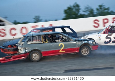 HALIFAX, NOVA SCOTIA - JUNE 26: The #2 car of Chris Smardon crashes during racing action at Scotia Speedworld in Halifax, June 26, 2009.