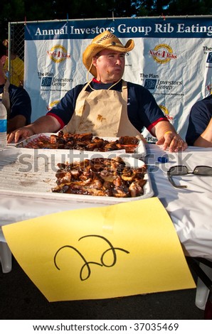 HALIFAX - AUGUST 22: Contestants in the rib eating contest at the annual Nuts4Ribs festival, August 22, 2009, in Halifax, Nova Scotia. Nuts4Ribs raises funds and awareness for testicular cancer.