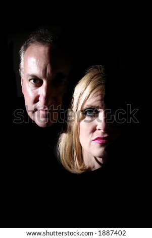 Husband and wife being exposed by coming into the light.