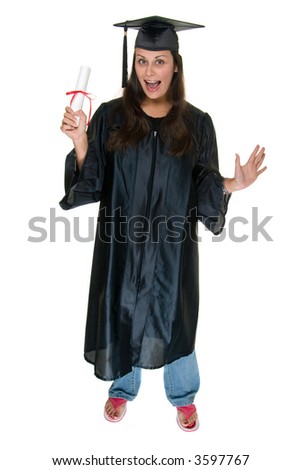 Very excited and happy beautiful young woman standing in graduation robes, cap and gown smiling and holding her diploma or degree. The graduate has moved the tassle from the left to the right side.