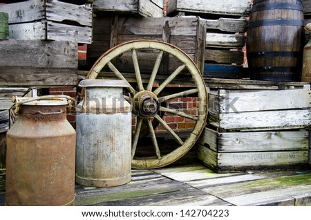 Arrangement of old stuff - Metal milk barrel, wooden boxes, fruit cases and other old stuff - Vintage / Old stuff from the farm