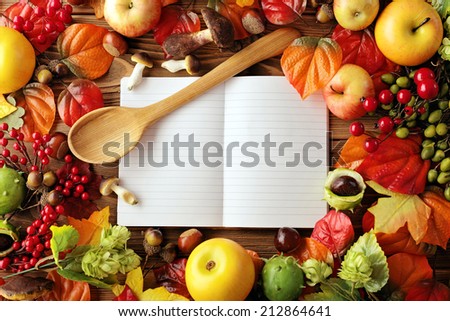 open cookbook. blank recipe book and food ingredients