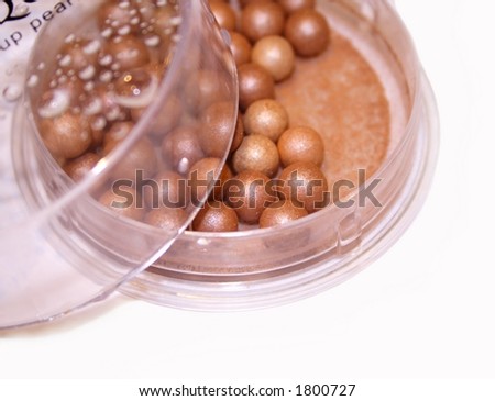 bronze pearls - Close up of face makeup powder compact bowls