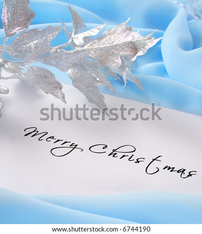 Christmas card. Holiday greetings on blue background