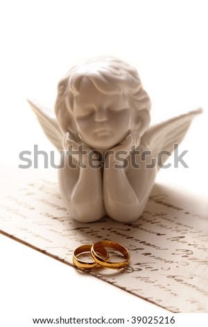 stock photo Wedding rings and wedding invitation