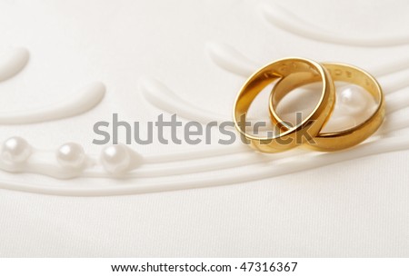 stock photo two golden wedding rings wedding invitation