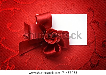 empty white gift card on red background