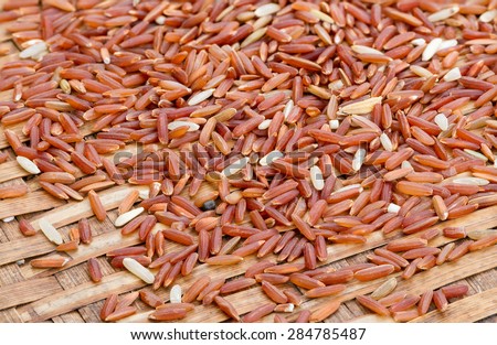 Organic Brown Rice (unpolished rice) on bamboo plate