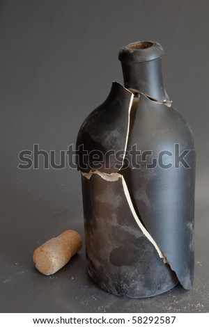 dust broken pottery bottle with cork
