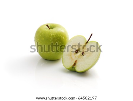 Green apples, half apple isolated on white.