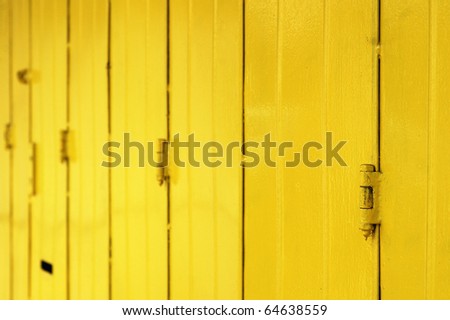 Row of wood yellow door.