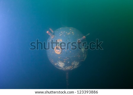 Old russian Anchor contact mine under water
