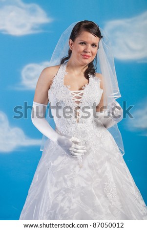 close-up portrait of bride dressed in elegance white wedding dress