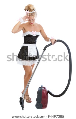 tired maid with vacuum cleaner
