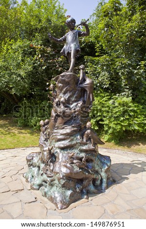 LONDON, UK - JULY 13, 2013: Peter Pan statue in Kensington Gardens, London.