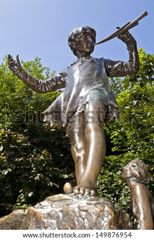 LONDON, UK - JULY 13, 2013: Peter Pan statue in Kensington Gardens, London.