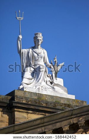 The Spirit of Liverpool white marble statue sitting proudly ontop of the Walker Art gallery in Liverpool.